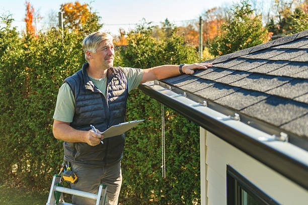 Professional Hail Damage Roof Repair technician working in Wasco, CA